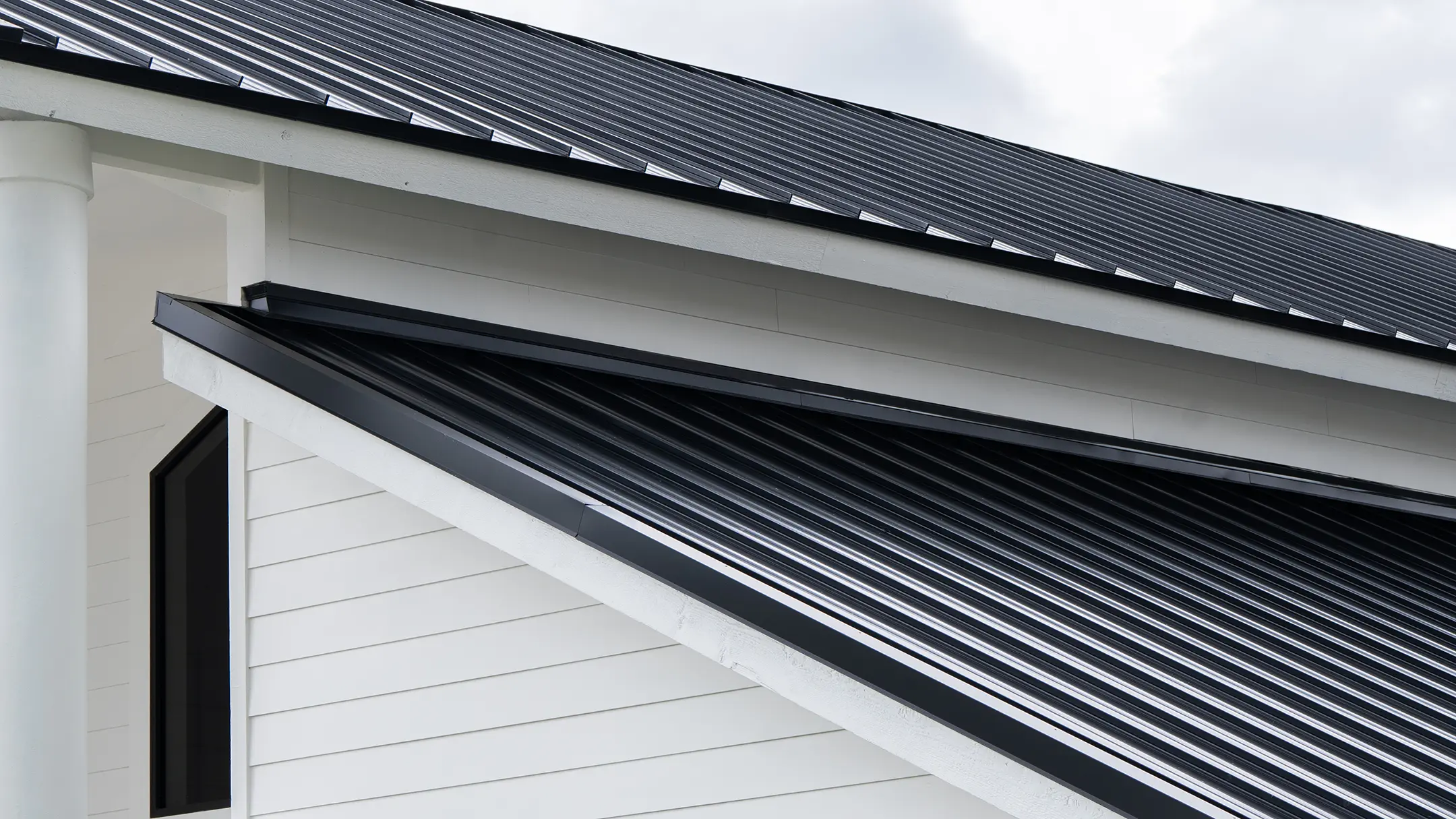 Dark Galvalume metal roof installed